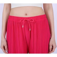 Pantalon coupe ample effet plissée avec une ceinture élastique