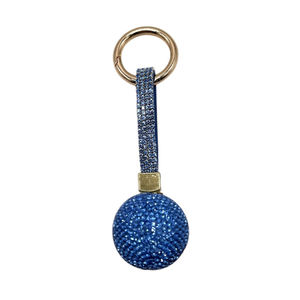 Porte-clés avec une boule de cristal entièrement orné de strass