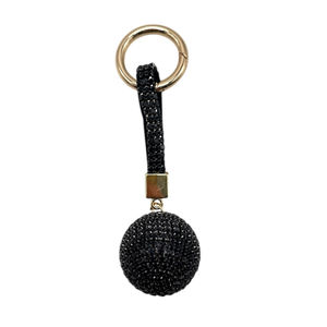 Porte-clés avec une boule de cristal entièrement orné de strass