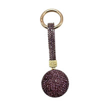Porte-clés avec une boule de cristal entièrement orné de strass