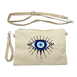 Petite trousse à motif "œil" avec une bandoulière amovible