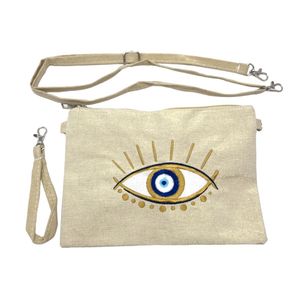 Petite trousse à motif "œil" avec une bandoulière amovible