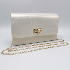 Sac à main pochette à rabat avec fermeture en tourniquet