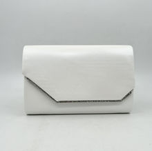 Pochette de soirée texturée avec un motif géométrique discret