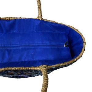 Sac de plage en paille orné de sequins aux motifs floraux éclatants