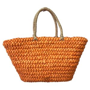 Sac de plage en paille fait à la main avec trois fleurs appliquées