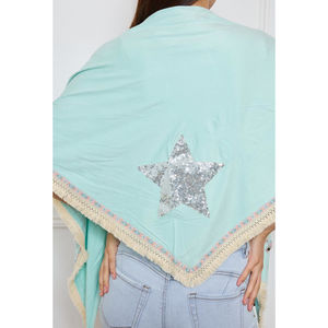 Cape à frange avec grande étoile en sequins au dos