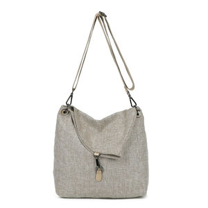 Sac bandoulière réalisé en toile avec rabat asymétrique