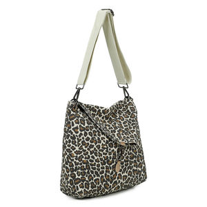 Sac bandoulière réalisé en toile avec rabat asymétrique