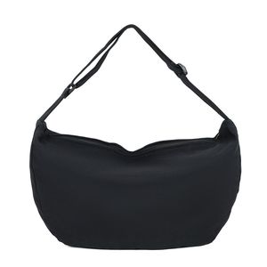 Sac porté en bandoulière tout en toile souple et et léger