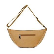 Sac bandoulière réalisé en toile et fermeture à glissière