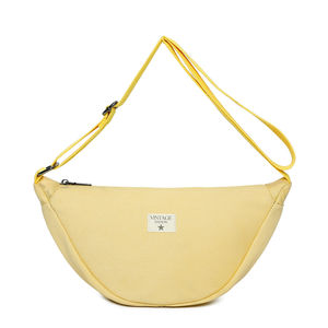 Sac bandoulière réalisé en toile et fermeture à glissière