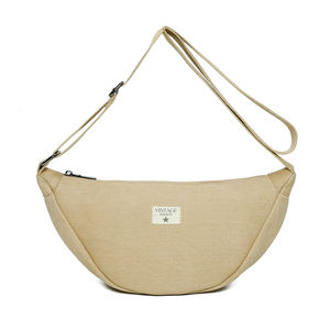 Sac bandoulière réalisé en toile et fermeture à glissière