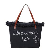 Cabas zippé "Libre comme l'air" et un oiseau accentué par des franges