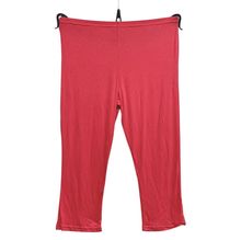 Legging court réalisé en viscose extensible d'une couleur unie