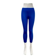 Legging d'une coupe capri fait de tissu uni en viscose stretch