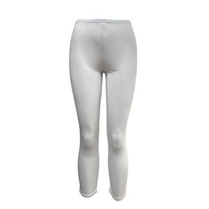 Legging d'une coupe capri fait de tissu uni en viscose stretch