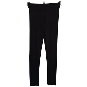 Legging d'une coupe capri fait de tissu uni en viscose stretch