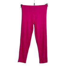 Legging d'une coupe capri fait de tissu uni en viscose stretch