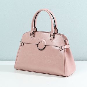 Sac à main cabas avec un décor frontal à anneau métallique
