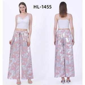 Pantalon élégant de coupe palazzo à reflets argent métallisés