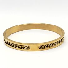 Bracelet en acier inoxydable doré avec une chaîne intégrée