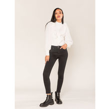 Pantalon jean skinny avec détail effiloché en bas