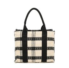 Sac fourre-tout attrayant avec un motif à carreaux épais