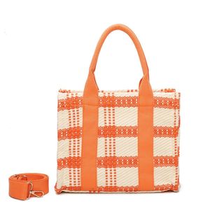 Sac fourre-tout attrayant avec un motif à carreaux épais