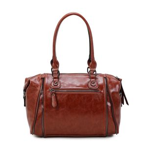 Sac à main bowling similicuir avec multiples zips décoratifs