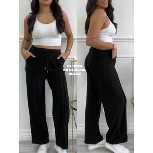 Pantalon ample orné de plis verticaux sur toute la longueur