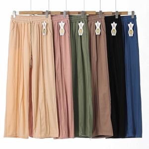 Pantalon ample orné de plis verticaux sur toute la longueur