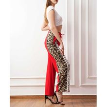 Pantalon sporty-chic avec bandes léopard et rayures sur les côtés