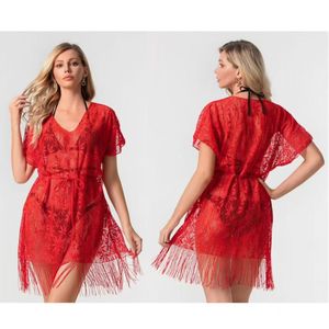 Tunique de plage en dentelle fleurie transparente à franges