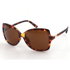 Lunettes de soleil UV400 style papillon avec un insert métal doré
