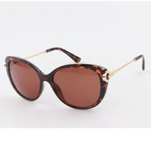 Lunettes de soleil femme à branches fines en métal doré anti-UV