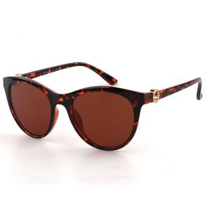 Lunettes de soleil anti-UV à l'insert orné d'un anneau stylisé doré