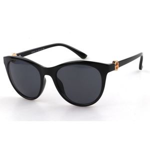 Lunettes de soleil anti-UV à l'insert orné d'un anneau stylisé doré