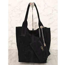 Cabas en cuir avec une trousse assortie et de pompon décoratif