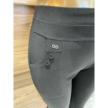 Pantalon slim grande taille avec poches à boutons décoratifs