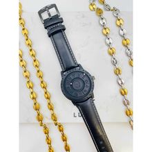 Montre bracelet analogique à disque rotatif avec motif