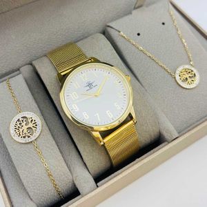 Coffret taupe : montre cerclée à lanière dorée + bijoux en acier