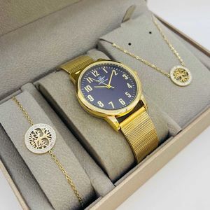 Coffret taupe : montre cerclée à lanière dorée + bijoux en acier