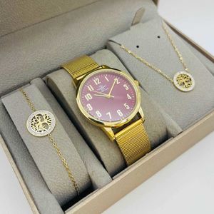 Coffret taupe : montre cerclée à lanière dorée + bijoux en acier