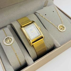 coffret taupe d'une montre à chiffres romains dorée + bijoux en acier