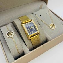 coffret taupe d'une montre à chiffres romains dorée + bijoux en acier