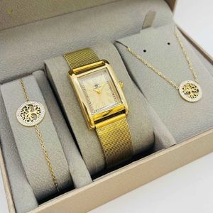 coffret taupe d'une montre à chiffres romains dorée + bijoux en acier