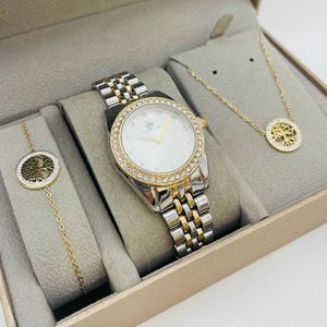 Coffret taupe : montre arrondie sertis de strass en métal argenté et doré + bijoux en acier