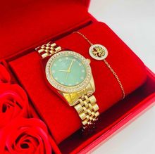 Coffret rouge : montre arrondie sertis de strass  doré + bracelet en acier