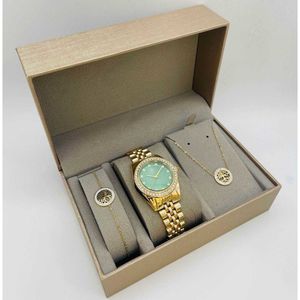 Coffret taupe : montre arrondie sertis de strass  doré + bijoux en acier